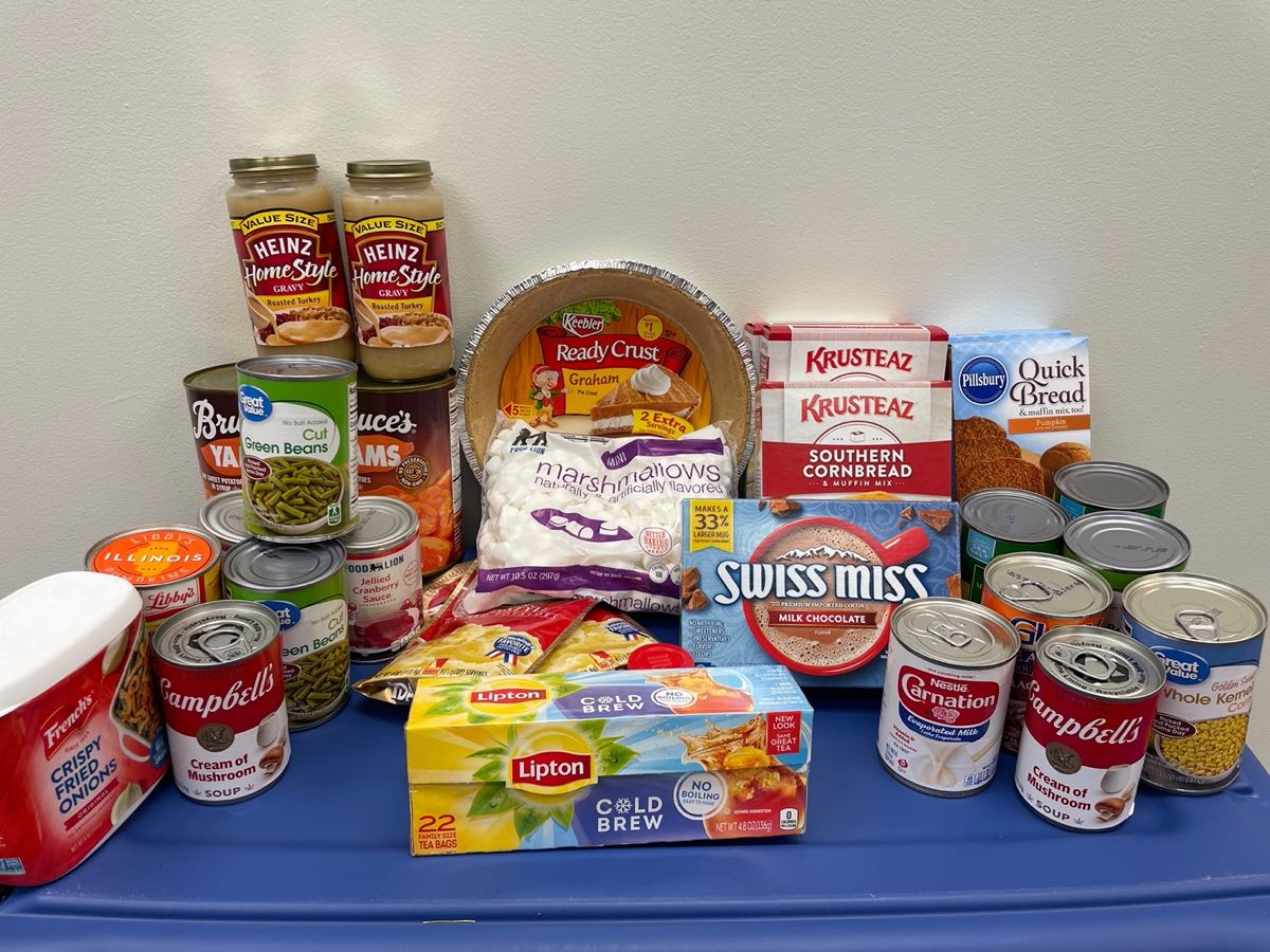 display of Thanksgiving food items on a blue tablecloth